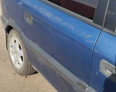 Синий Опель Зафира, объемом двигателя 2 л и пробегом 300 тыс. км за 959 $, фото 4 на Automoto.ua