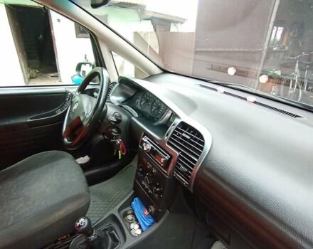 Синий Опель Зафира, объемом двигателя 1.6 л и пробегом 270 тыс. км за 4000 $, фото 27 на Automoto.ua