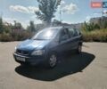 Синий Опель Зафира, объемом двигателя 1.8 л и пробегом 280 тыс. км за 3900 $, фото 1 на Automoto.ua