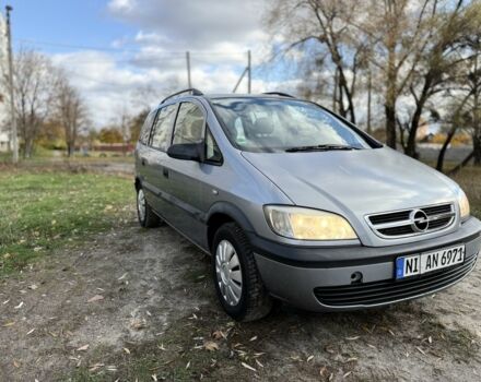 Синий Опель Зафира, объемом двигателя 1.8 л и пробегом 300 тыс. км за 1650 $, фото 1 на Automoto.ua