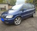 Синій Опель Зафіра, об'ємом двигуна 2 л та пробігом 341 тис. км за 3999 $, фото 1 на Automoto.ua