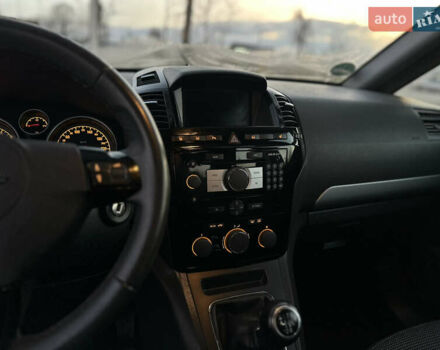 Синий Опель Зафира, объемом двигателя 1.8 л и пробегом 217 тыс. км за 7000 $, фото 27 на Automoto.ua