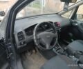 Синий Опель Зафира, объемом двигателя 2 л и пробегом 300 тыс. км за 3600 $, фото 2 на Automoto.ua