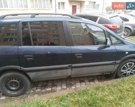 Синий Опель Зафира, объемом двигателя 2 л и пробегом 250 тыс. км за 2500 $, фото 1 на Automoto.ua