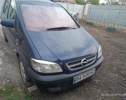 Синий Опель Зафира, объемом двигателя 2 л и пробегом 300 тыс. км за 3600 $, фото 1 на Automoto.ua