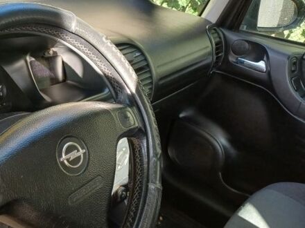 Синий Опель Зафира, объемом двигателя 2 л и пробегом 350 тыс. км за 4686 $, фото 1 на Automoto.ua