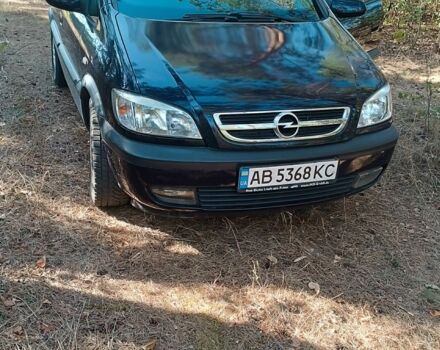 Синий Опель Зафира, объемом двигателя 1.8 л и пробегом 221 тыс. км за 4400 $, фото 1 на Automoto.ua