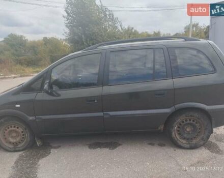 Зеленый Опель Зафира, объемом двигателя 2 л и пробегом 400 тыс. км за 3500 $, фото 1 на Automoto.ua