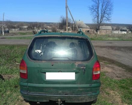 Зеленый Опель Зафира, объемом двигателя 2 л и пробегом 385 тыс. км за 592 $, фото 1 на Automoto.ua