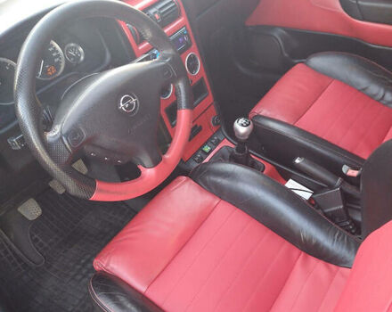 Черный Опель Astra Coupe Bertone, объемом двигателя 2 л и пробегом 175 тыс. км за 5500 $, фото 4 на Automoto.ua
