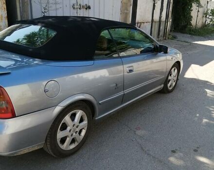 Серый Опель Astra Coupe Bertone, объемом двигателя 2.2 л и пробегом 176 тыс. км за 6500 $, фото 12 на Automoto.ua