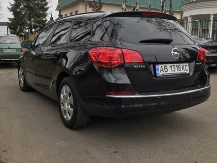 Опель Astra Sports Tourer 2013 у Житомирі на Automoto.ua Чорний Опель Astra Sports Tourer, об'ємом двигуна 1.3 л та пробігом 280 тис. км за 7655 $, фото 1 на Automoto.ua