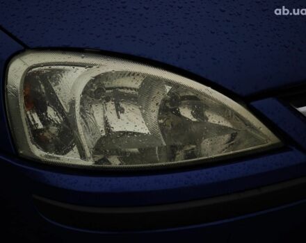 Синий Опель Combo Life, объемом двигателя 1.7 л и пробегом 353 тыс. км за 4690 $, фото 3 на Automoto.ua