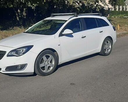 Белый Опель Insignia Sports Tourer, объемом двигателя 2 л и пробегом 320 тыс. км за 7999 $, фото 1 на Automoto.ua