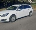 Белый Опель Insignia Sports Tourer, объемом двигателя 2 л и пробегом 320 тыс. км за 7999 $, фото 1 на Automoto.ua