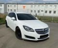 Белый Опель Insignia Sports Tourer, объемом двигателя 2 л и пробегом 146 тыс. км за 9200 $, фото 1 на Automoto.ua