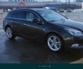 Черный Опель Insignia Sports Tourer, объемом двигателя 2 л и пробегом 310 тыс. км за 7999 $, фото 1 на Automoto.ua