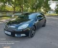 Чорний Опель Insignia Sports Tourer, об'ємом двигуна 2 л та пробігом 188 тис. км за 9058 $, фото 1 на Automoto.ua