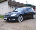 Чорний Опель Insignia Sports Tourer, об'ємом двигуна 2 л та пробігом 202 тис. км за 9550 $, фото 1 на Automoto.ua