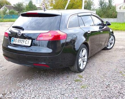 Черный Опель Insignia Sports Tourer, объемом двигателя 2 л и пробегом 202 тыс. км за 9550 $, фото 2 на Automoto.ua