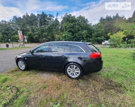 Чорний Опель Insignia Sports Tourer, об'ємом двигуна 2 л та пробігом 290 тис. км за 8800 $, фото 2 на Automoto.ua