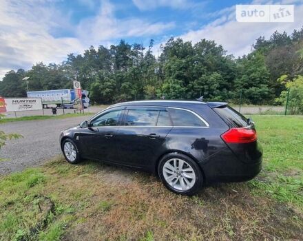 Чорний Опель Insignia Sports Tourer, об'ємом двигуна 2 л та пробігом 290 тис. км за 8800 $, фото 1 на Automoto.ua