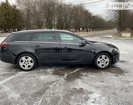 Черный Опель Insignia Sports Tourer, объемом двигателя 2 л и пробегом 220 тыс. км за 7500 $, фото 5 на Automoto.ua