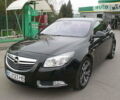 Черный Опель Insignia Sports Tourer, объемом двигателя 2 л и пробегом 221 тыс. км за 9500 $, фото 1 на Automoto.ua