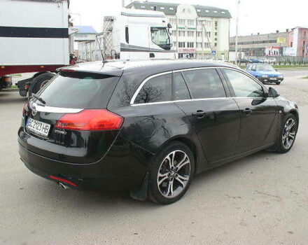 Черный Опель Insignia Sports Tourer, объемом двигателя 2 л и пробегом 221 тыс. км за 9500 $, фото 5 на Automoto.ua