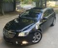 Черный Опель Insignia Sports Tourer, объемом двигателя 2 л и пробегом 173 тыс. км за 11450 $, фото 10 на Automoto.ua