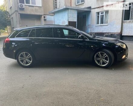 Черный Опель Insignia Sports Tourer, объемом двигателя 2 л и пробегом 173 тыс. км за 11450 $, фото 6 на Automoto.ua