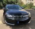 Черный Опель Insignia Sports Tourer, объемом двигателя 2 л и пробегом 223 тыс. км за 11500 $, фото 1 на Automoto.ua