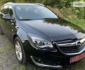 Чорний Опель Insignia Sports Tourer, об'ємом двигуна 2 л та пробігом 184 тис. км за 13350 $, фото 1 на Automoto.ua