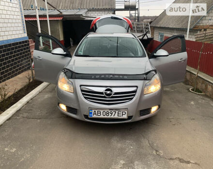 Сірий Опель Insignia Sports Tourer, об'ємом двигуна 2 л та пробігом 260 тис. км за 10000 $, фото 4 на Automoto.ua