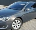 Серый Опель Insignia Sports Tourer, объемом двигателя 2 л и пробегом 227 тыс. км за 11400 $, фото 1 на Automoto.ua