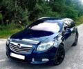 Синій Опель Insignia Sports Tourer, об'ємом двигуна 2 л та пробігом 238 тис. км за 9900 $, фото 1 на Automoto.ua