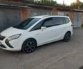 Белый Опель Zafira Tourer, объемом двигателя 1.6 л и пробегом 174 тыс. км за 11000 $, фото 1 на Automoto.ua