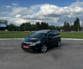 Черный Опель Zafira Tourer, объемом двигателя 2 л и пробегом 217 тыс. км за 10400 $, фото 1 на Automoto.ua