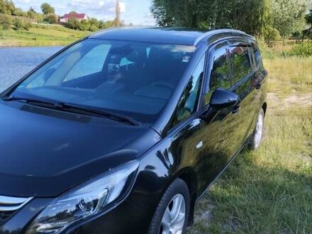 Черный Опель Zafira Tourer, объемом двигателя 1.6 л и пробегом 211 тыс. км за 9200 $, фото 1 на Automoto.ua