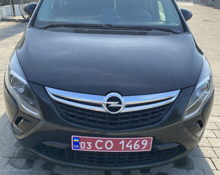 Черный Опель Zafira Tourer, объемом двигателя 1.6 л и пробегом 280 тыс. км за 11500 $, фото 1 на Automoto.ua