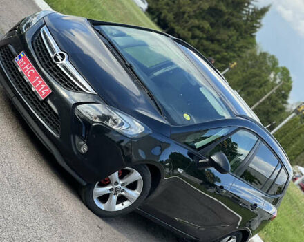 Черный Опель Zafira Tourer, объемом двигателя 2 л и пробегом 227 тыс. км за 8900 $, фото 1 на Automoto.ua