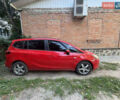 Красный Опель Zafira Tourer, объемом двигателя 2 л и пробегом 220 тыс. км за 10500 $, фото 1 на Automoto.ua