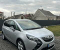Серый Опель Zafira Tourer, объемом двигателя 2 л и пробегом 250 тыс. км за 8600 $, фото 2 на Automoto.ua