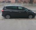 Серый Опель Zafira Tourer, объемом двигателя 1.6 л и пробегом 185 тыс. км за 10000 $, фото 2 на Automoto.ua