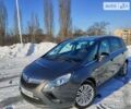 Серый Опель Zafira Tourer, объемом двигателя 1.6 л и пробегом 215 тыс. км за 11999 $, фото 1 на Automoto.ua