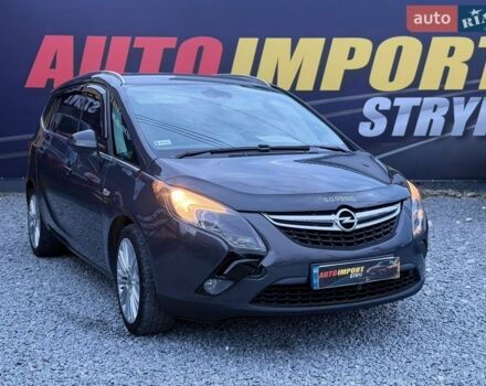 Серый Опель Zafira Tourer, объемом двигателя 1.6 л и пробегом 282 тыс. км за 7800 $, фото 1 на Automoto.ua