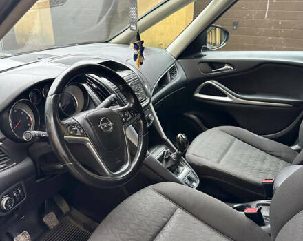 Синий Опель Zafira Tourer, объемом двигателя 2 л и пробегом 250 тыс. км за 7200 $, фото 2 на Automoto.ua