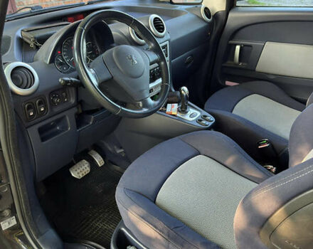 Черный Пежо 1007, объемом двигателя 1.59 л и пробегом 147 тыс. км за 4800 $, фото 1 на Automoto.ua