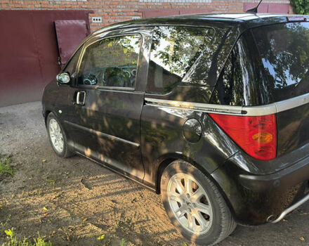 Черный Пежо 1007, объемом двигателя 1.59 л и пробегом 147 тыс. км за 4800 $, фото 4 на Automoto.ua