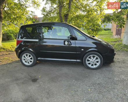 Черный Пежо 1007, объемом двигателя 1.59 л и пробегом 147 тыс. км за 4800 $, фото 3 на Automoto.ua